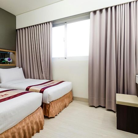 Harmonious Hotel Гаосюн Экстерьер фото